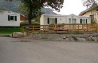 Eén van de bungalows op Camping Grands Cols